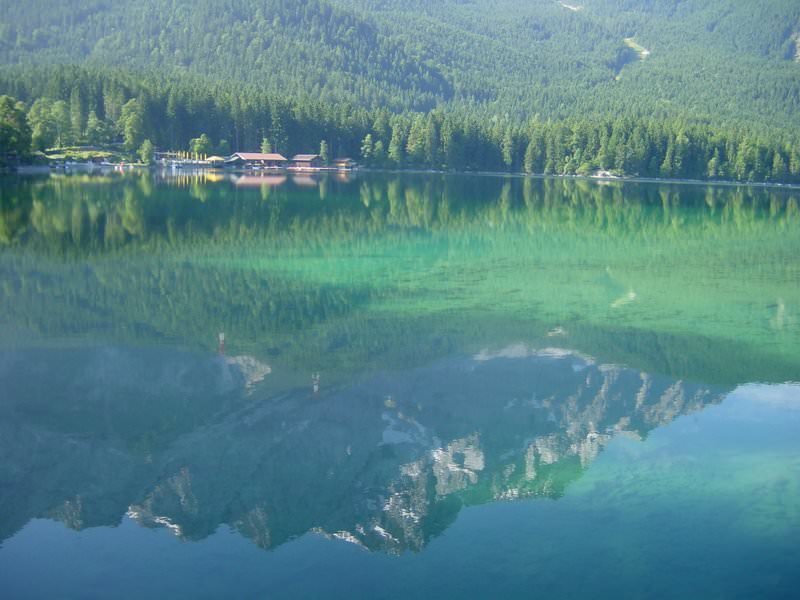 008 A reflection of the Zugspitzsummit in the crystal clear water of lake E